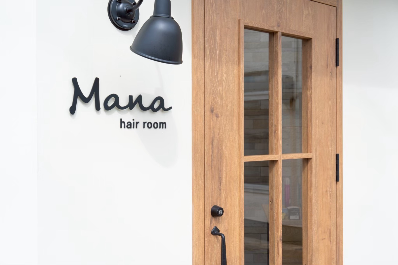 hair room Mana の外観・看板